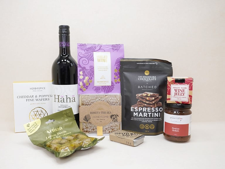 Gourmet Red Wine Hamper featuring Sileni Merlot, mulled wine spices, artisan olives, honeycomb, BiteMeat jerky, Pinot Noir jelly, espresso martini chocolate, cheddar and poppy seed wafers, festive relish, and Opito Bay salt, thoughtfully curated for entertaining, grazing, and wine lovers.