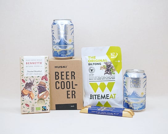Beer O'Clock Gift Box featuring Garage Project craft beer, a HUSKI beer cooler, BiteMeat jerky, Whittaker's Sante bars, and Bennetto Hazelnut Chocolate, thoughtfully curated for craft beer lovers and gifts for him.