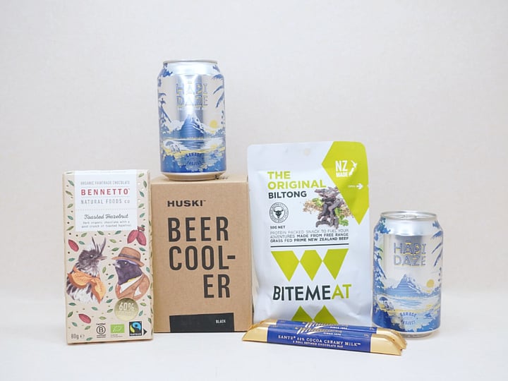 Beer O'Clock Gift Box featuring Garage Project craft beer, a HUSKI beer cooler, BiteMeat jerky, Whittaker's Sante bars, and Bennetto Hazelnut Chocolate, thoughtfully curated for craft beer lovers and gifts for him.