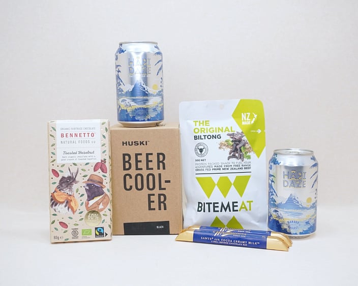Beer O'Clock Gift Box featuring Garage Project craft beer, a HUSKI beer cooler, BiteMeat jerky, Whittaker's Sante bars, and Bennetto Hazelnut Chocolate, thoughtfully curated for craft beer lovers and gifts for him.
