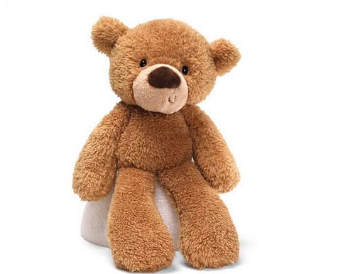 Beige GUND Fuzzy teddy bear with floppy arms and legs