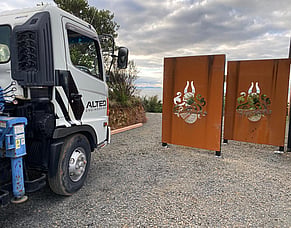 Corten Screening and a Family Crest on a Hilltop Home