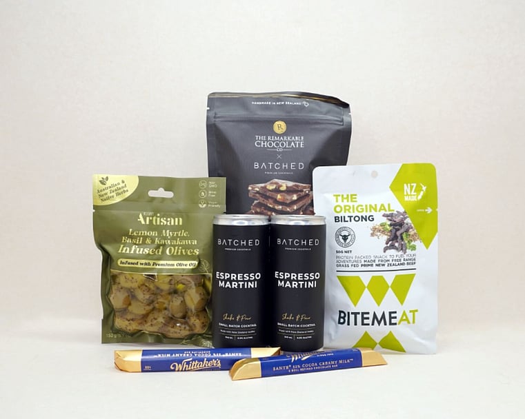 The Martini Moment Gift Box featuring Batched Martini cans, artisan lemon myrtle and kawakawa olives, Batched espresso chocolate, BitMeat beef jerky, and Whittaker's Sante Bars, thoughtfully curated for gifting and celebrations in New Zealand.