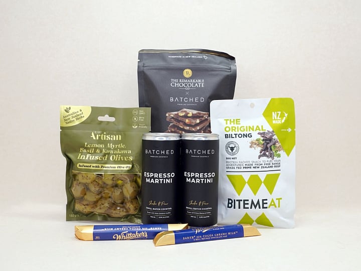 The Martini Moment Gift Box featuring Batched Martini cans, artisan lemon myrtle and kawakawa olives, Batched espresso chocolate, BitMeat beef jerky, and Whittaker's Sante Bars, thoughtfully curated for gifting and celebrations in New Zealand.