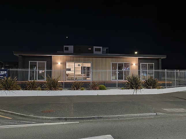 Napier show home lit up at night
