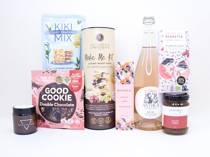 The KYND Gesture Gift Box featuring Anthea alcohol-free spritz, Bennetto chocolate, Stella candle, Botanicals hand cream, gourmet crackers and NZ-made treats.