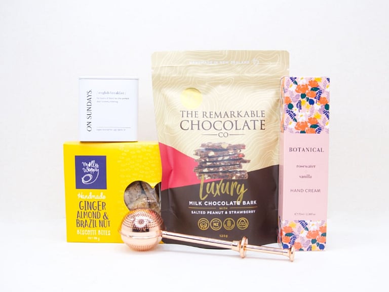 The Tea Break gift box with loose-leaf tea, Better Tea Diffuser, hand cream, biscotti and strawberry brittle