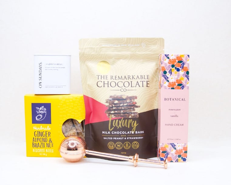 The Tea Break gift box with loose-leaf tea, Better Tea Diffuser, hand cream, biscotti and strawberry brittle