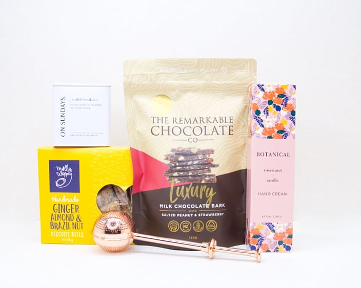 The Tea Break gift box with loose-leaf tea, Better Tea Diffuser, hand cream, biscotti and strawberry brittle