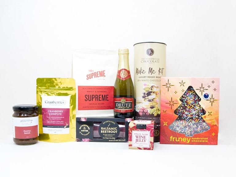 The Festive Table Christmas gift box with sparkling wine, gourmet Christmas treats, crackers, coffee and festive chocolate