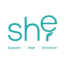 SHE Support Heal Empower logo
