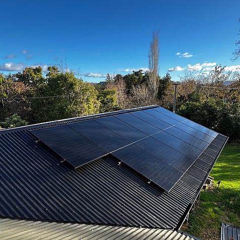 All-black panels on a Tauranga roof