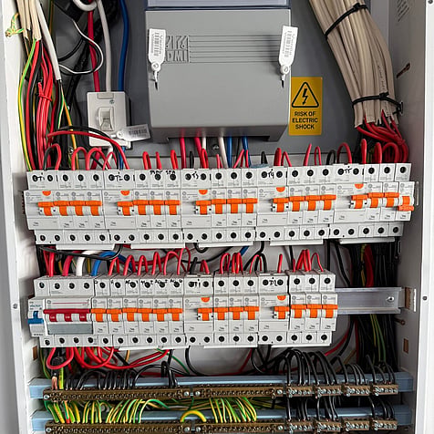 Large switchboard upgrade with neat breaker rows, Cambridge