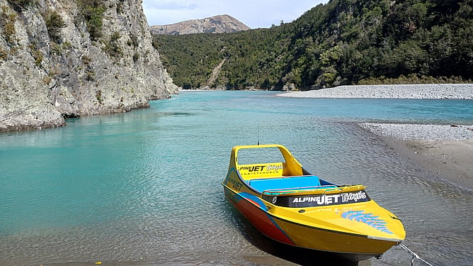 Jet boating on the turquoise Waimakariri River near Springfield, Canterbury.
