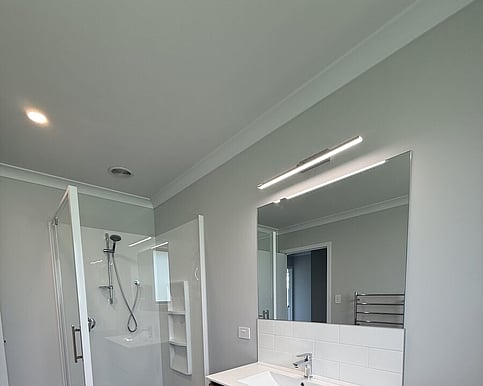 Ensuite with a walk-in shower and a timber-look vanity