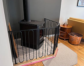 Custom fire guard with arched detailing
