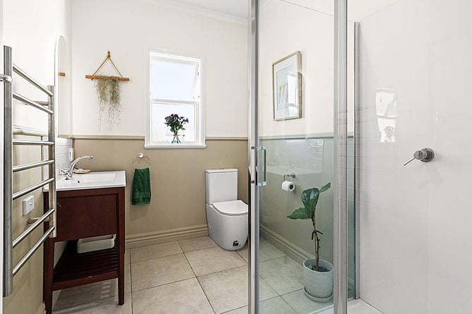 Renovated main bathroom in a Taradale house, with a new shower and heated towel rail