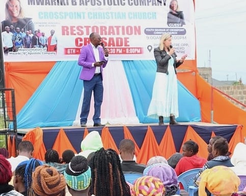 Preaching the gospel on stage.