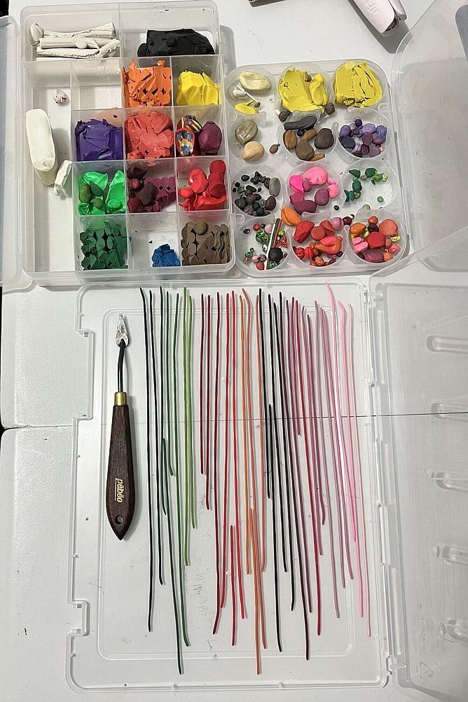 Emy Oikawa’s coloured clay and tools for making clay wall art