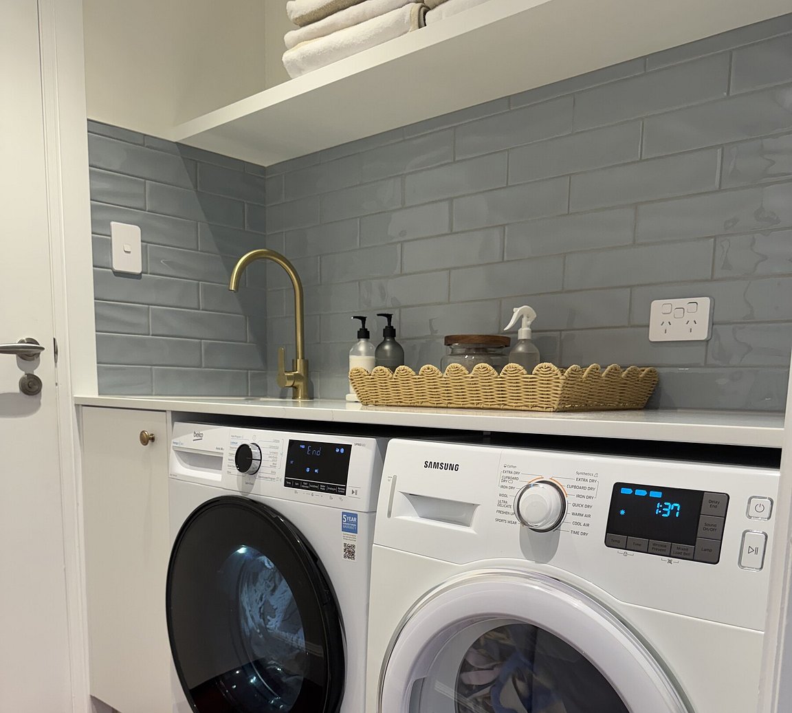 Fully equipped modern laundry at Crab Shack Cottage 4-bedroom holiday home Russell