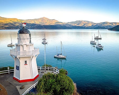 Akaroa lighthouse and yachts on Akaroa Harbour, Banks Peninsula