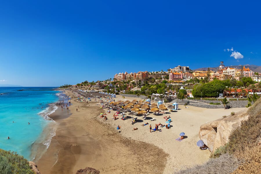 Golden sand beach and hotels in Costa Adeje, Tenerife