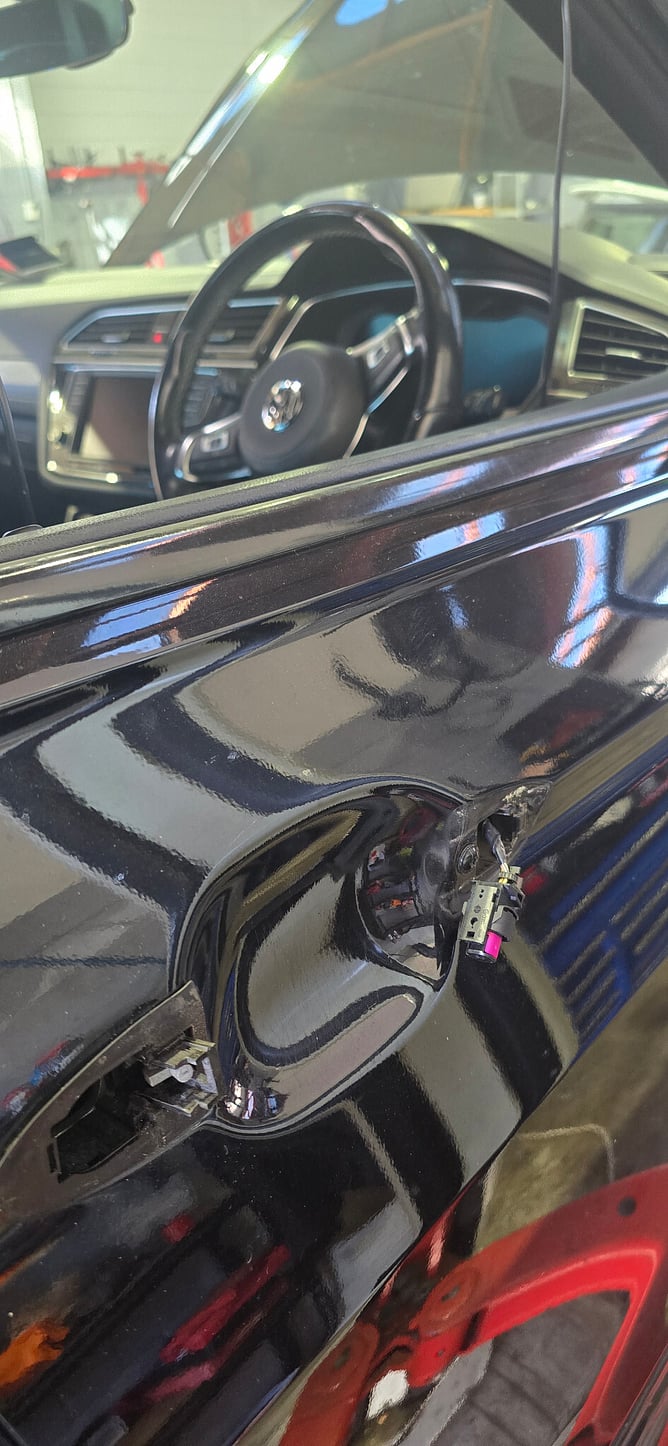 VW Tiguan exterior door handle removed during a keyless-access repair at Speedwell.