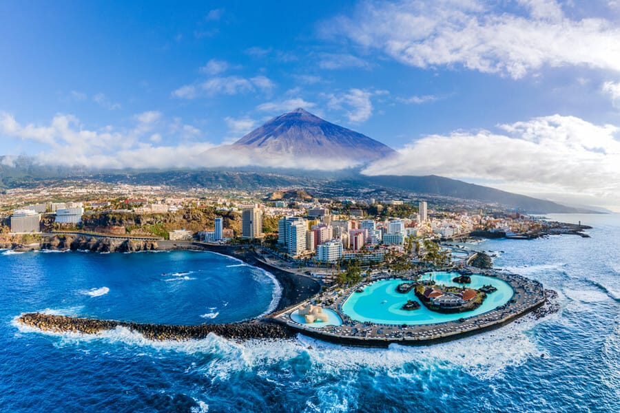 Puerto de la Cruz and the Lago Martiánez seawater pools with Mount Teide behind, Tenerife